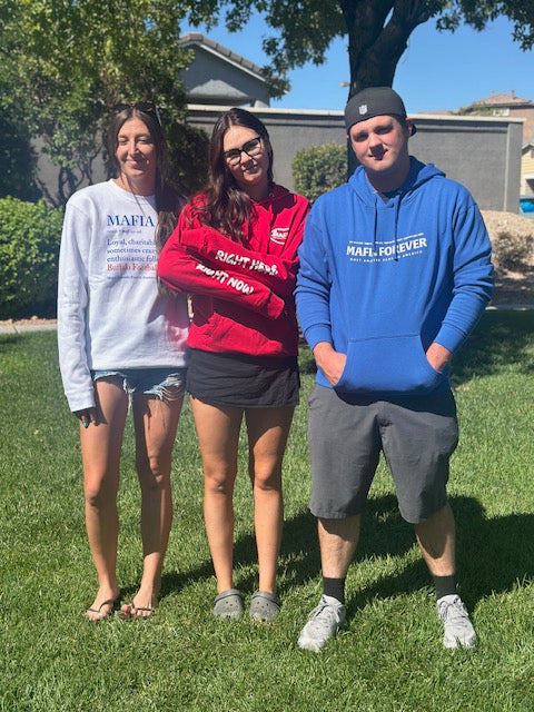 Three fans in MAFIA gear